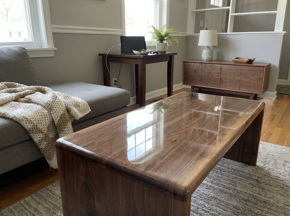 Walnut epoxy coffee table in a thoughtfully designed living room with complementary furnishings, illustrating how careful planning creates a cohesive, timeless space.