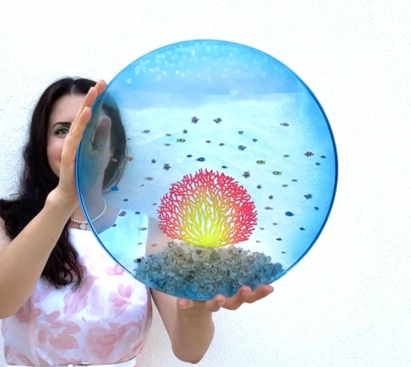 A finished epoxy resin art piece made with carefully measured epoxy batches.