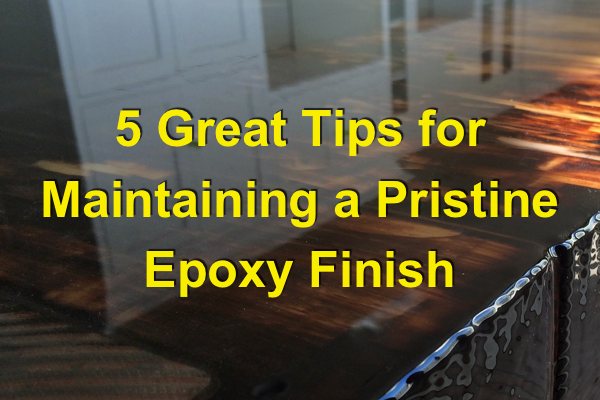 An up-close photo of an epoxy table top with a flawless epoxy finish. There's a text overlay that says "5 Great Tips for Maintaining a Pristine Epoxy Finish".