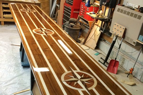 A long epoxy DIY bar top made using UltraClear Bar & Table Top Epoxy. It has been provided a great environment for curing.