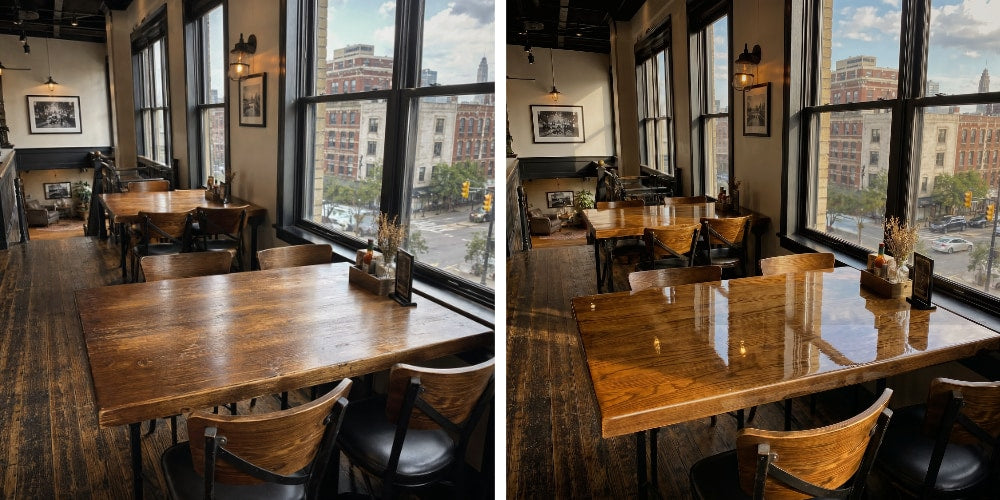 Before-and-after comparison of restaurant dining tables beside large city-view windows, showing worn wood surfaces transformed into glossy epoxy-coated tabletops with rich grain and reflective shine.
