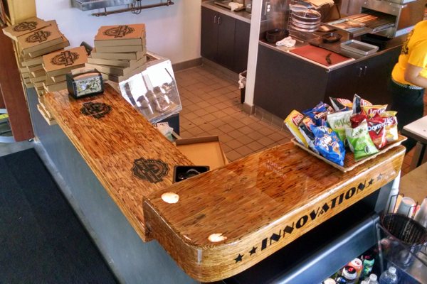 A restaurant bar top with an UltraClear Bar & Table Top Epoxy finish