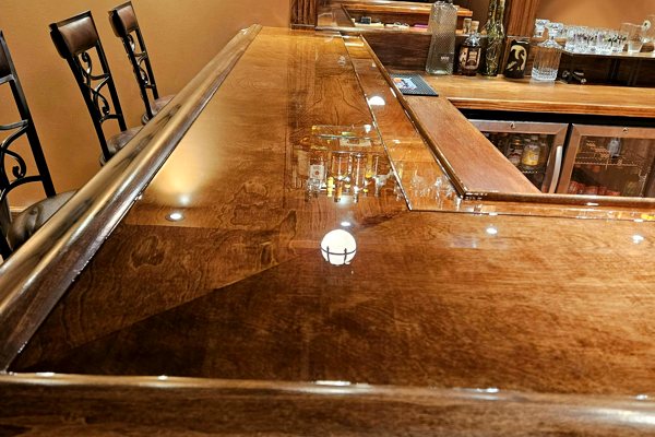 A DIY wooden home epoxy bar top. It has been finished with UltraClear Bar & Table Top Epoxy.