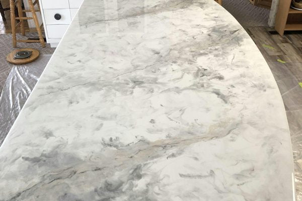 A photo of an epoxy kitchen countertop made to look like marble, using UltraClear Bar & Table Top Epoxy as well as various powder pigments.