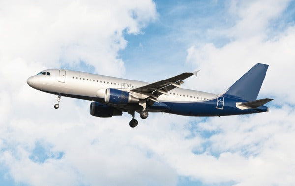 An airplane, which often features resin-reinforced-fiber materials.