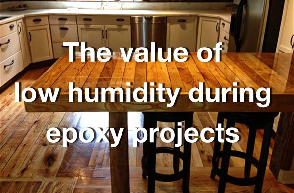 A photo of a successfully completed epoxy countertop with a text overlay that says "The value of low humidity during epoxy projects."