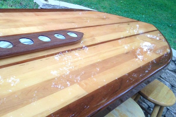 An outdoor epoxy bar top with an UltraClear Bar & Table Top Epoxy finish for long-lasting outdoor protection.