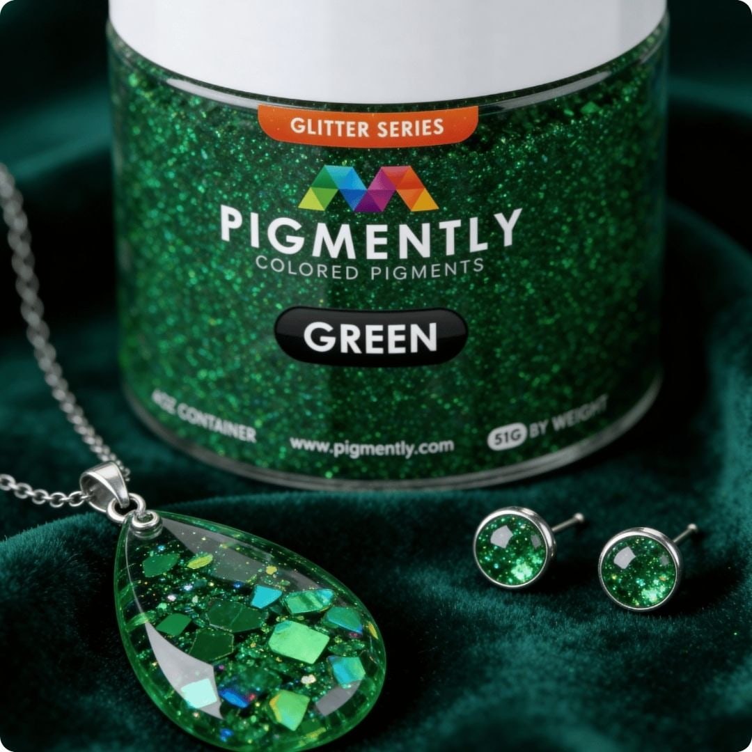 Green glitter jewelry set with Pigmently container on a dark green background