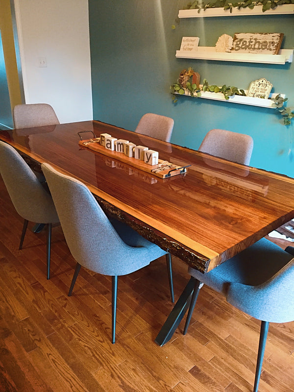 A wooden epoxy dinner table