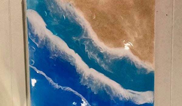 A beach-themed epoxy painting