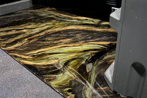 A custom truck bed made of UltraClear Bar & Table Top Epoxy. Several batches of epoxy were poured simultaneously in different colors to produce a multi-toned swirling effect.