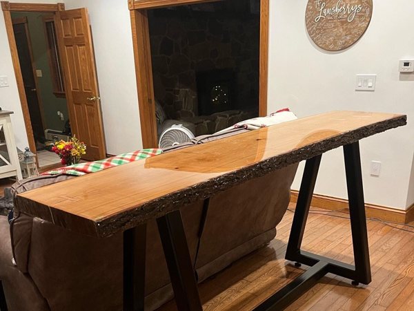 A live-edge wooden epoxy table.
