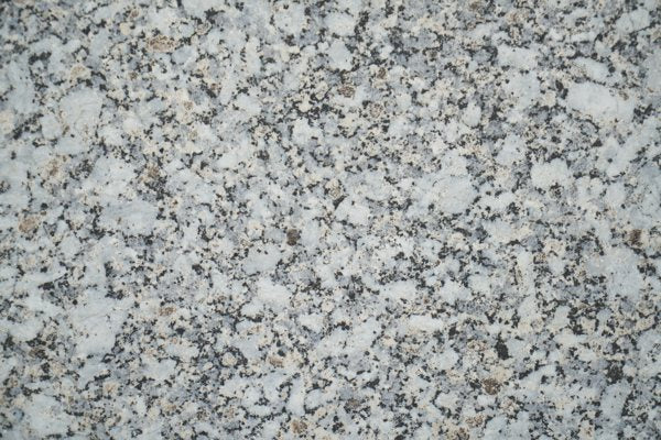 A white-and-black granite surface.