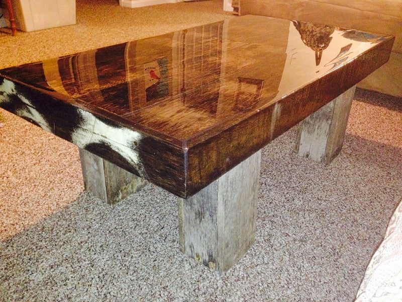A wooden epoxy block table