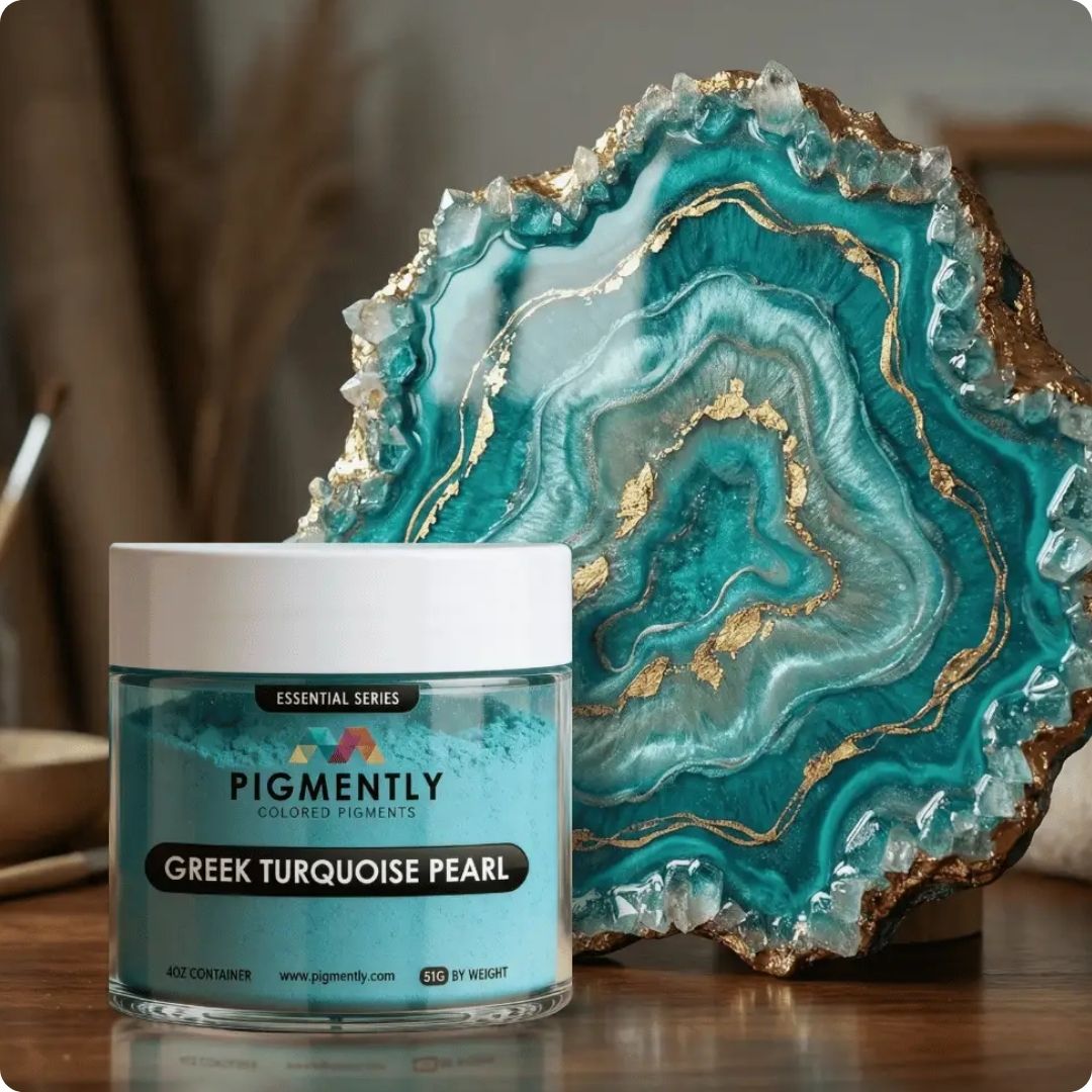 Jar of powder pigment Greek Turquoise Pearl pigment next to a decorative geode on a wooden surface.